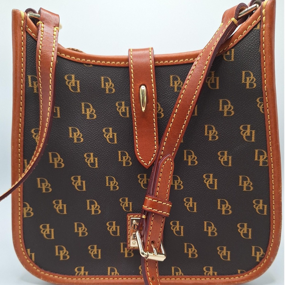 Dooney & Bourke logo crossbody bag with leather trip